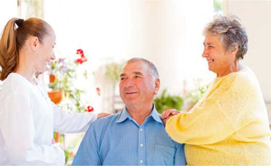 three people smiling