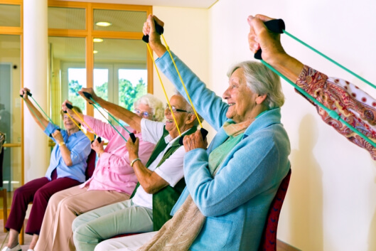 group of elderly exercising